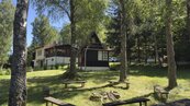 Prodej dřevěné chaty s podezdívkou, vlastním pozemkem v klidné osadě Jenišov u Horní Plané, cena 1650000 CZK / objekt, nabízí
