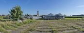 Zemědělský areál (pozemky) o celkové výměře 11.704 m2 v Holicích, cena 8700000 CZK / objekt, nabízí