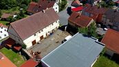 Areál pro podnikání zahrnující provozní budovu s byty, dílnami a sklady a budovu garáží-autodílen, cena cena v RK, nabízí
