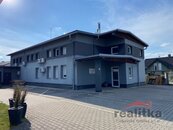 Prodej rodinného domu s bytem, s komerčním prostorem, garáži a zahradou, ul. Lužická, Opava, cena 14800000 CZK / objekt, nabízí